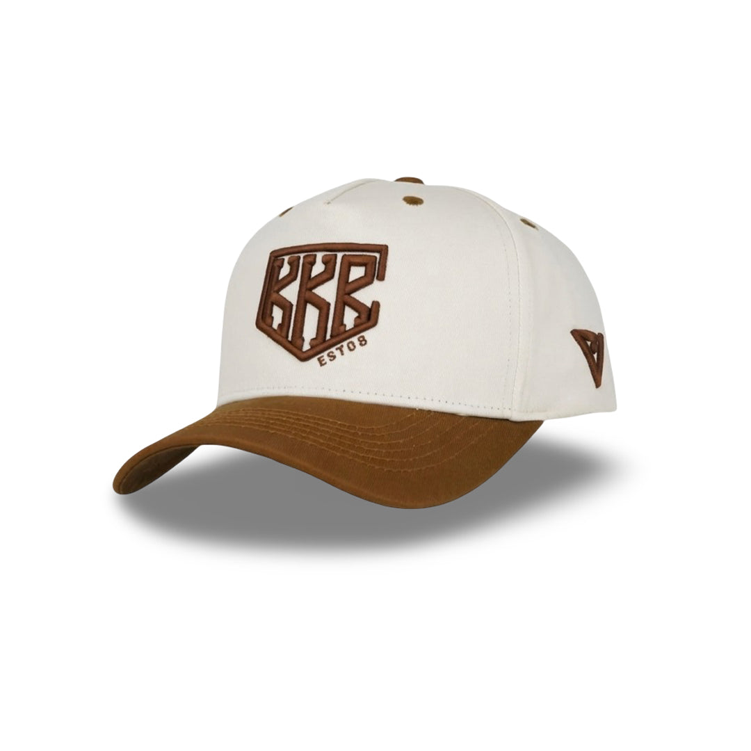 ValienteCaps Desert Crest cap with adjustable strap, beige fabric, and embroidered desert-themed design on front.
