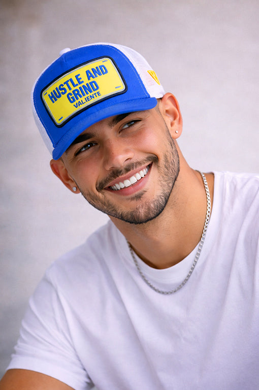 
                  
                    "Hustle and Grind" Trucker Hat — No Excuses, Just Results
                  
                