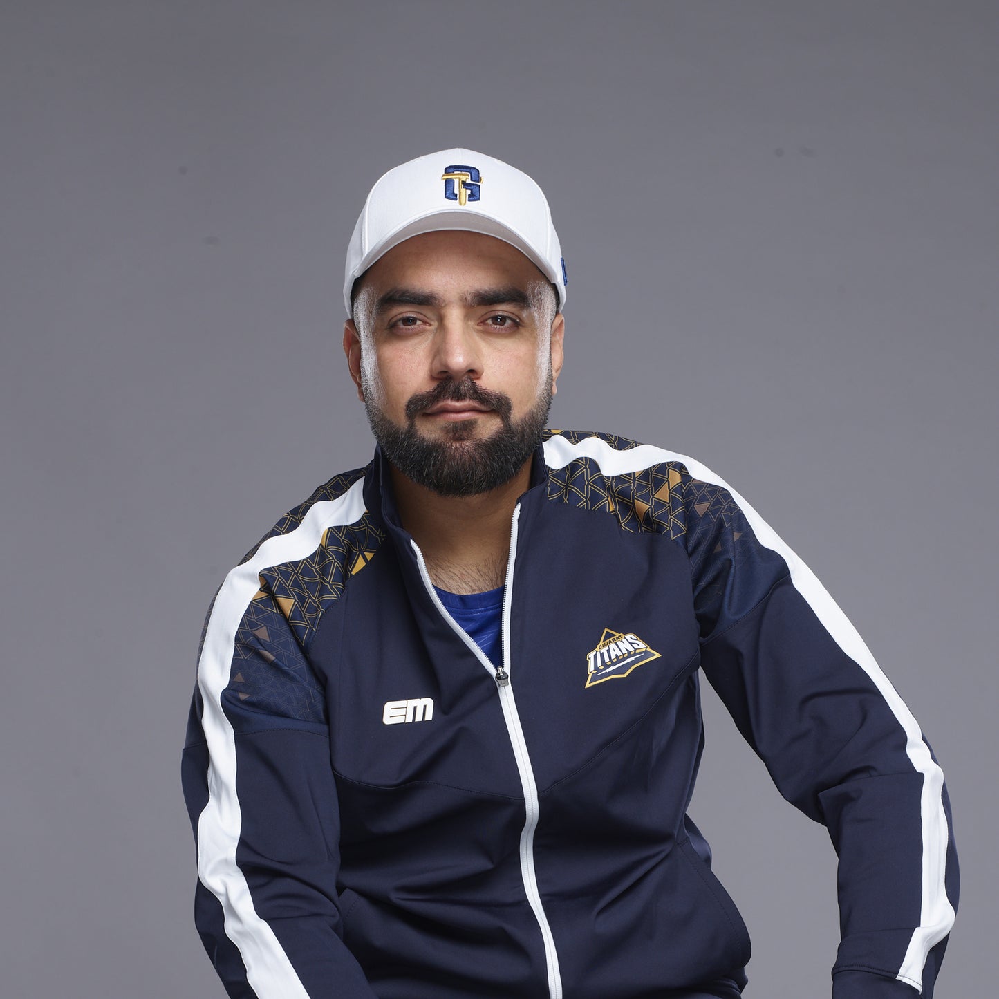 
                  
                    ValienteCaps GT white baseball cap with adjustable strap and embroidered logo, shown on a plain background.
                  
                