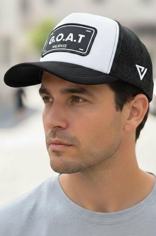 
                  
                    "GOAT" Trucker Hat — Be Legendary, Own the Game - valientecaps
                  
                